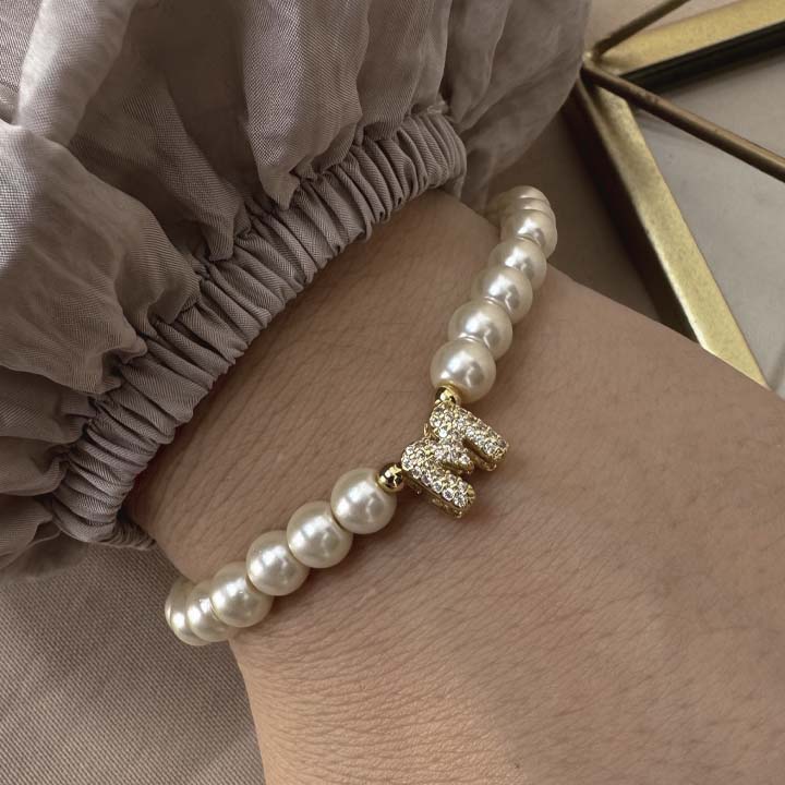 Pulsera perlitas inicial de luz