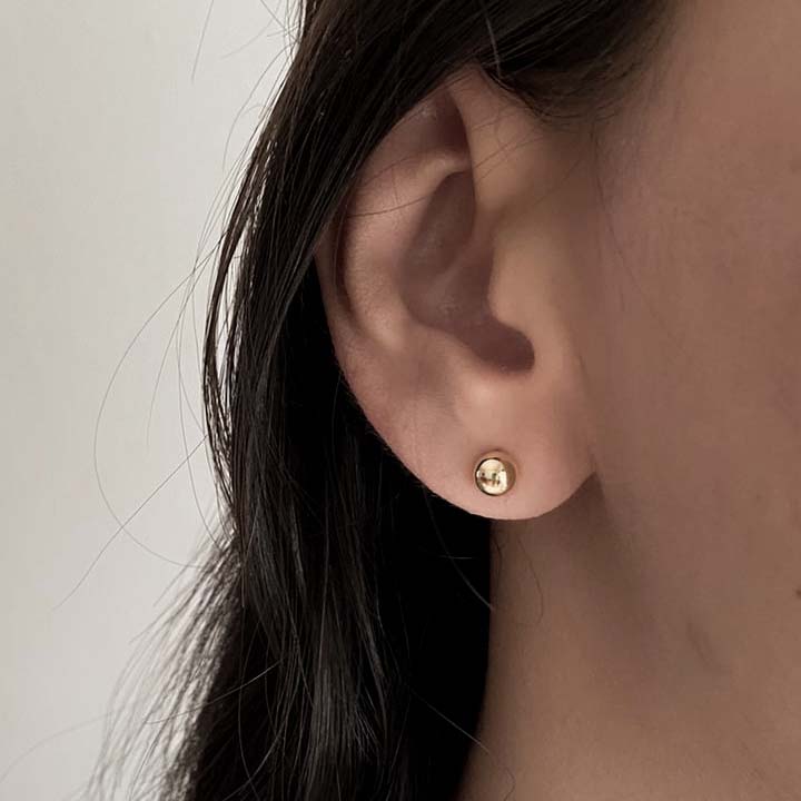 Topo balines dorados