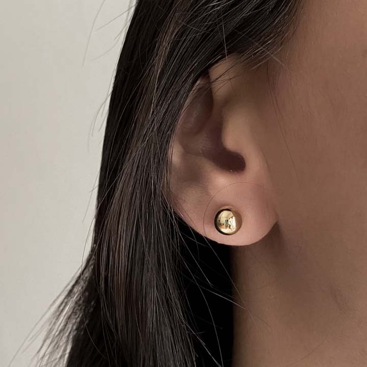 Topo balines dorados