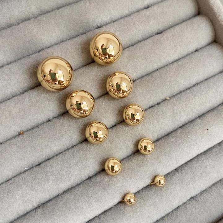 Topo balines dorados