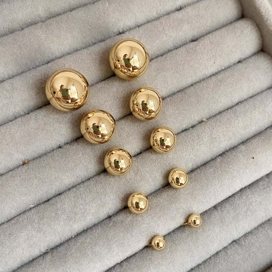 Topo balines dorados