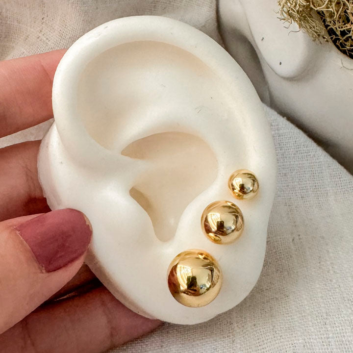 Topo balines dorados