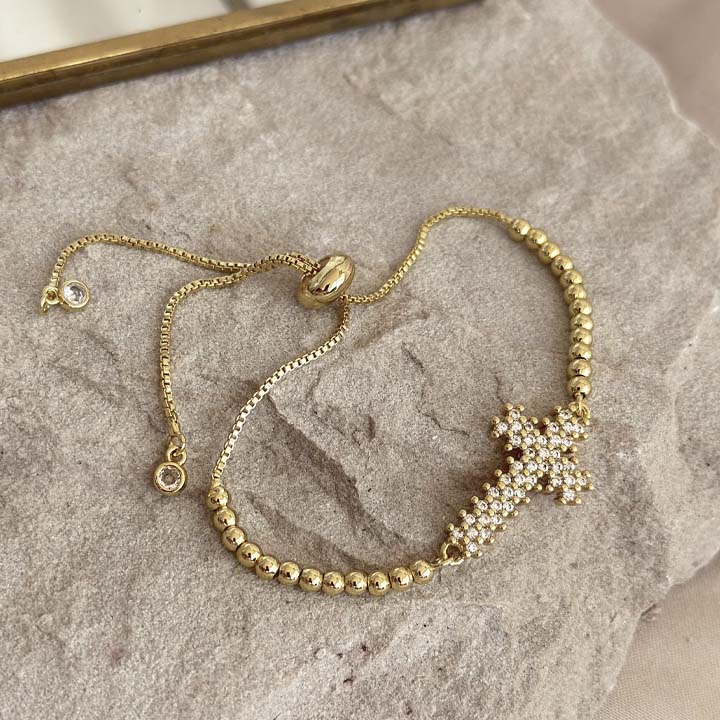 Pulsera cruz de luz