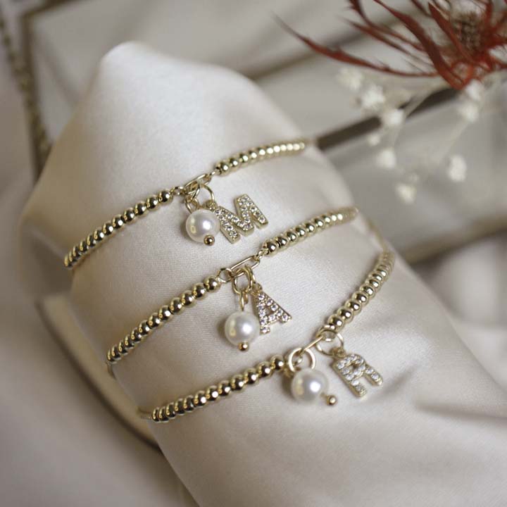Pulsera inicial perla
