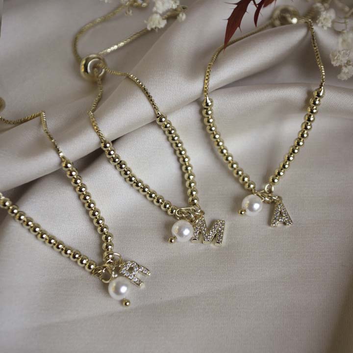 Pulsera inicial perla