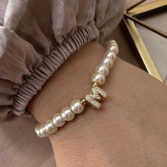 Pulsera perlitas inicial de luz